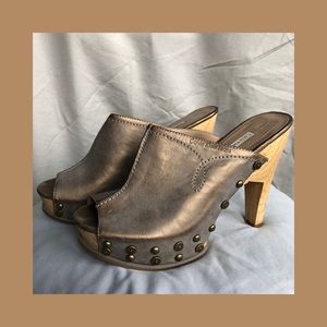 Calvin Klein metallic platform clogs with studs